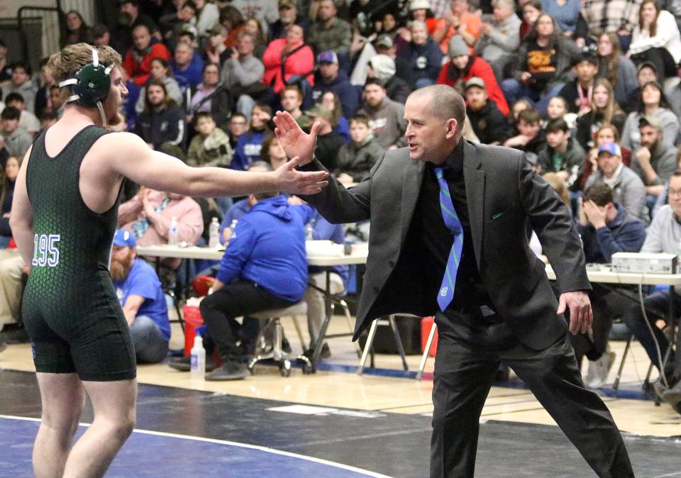 Colchester coach Scott McPherson, seen here at the 2023 Vermont wrestling state championship, revived the high school program along with his team of assistant coaches.