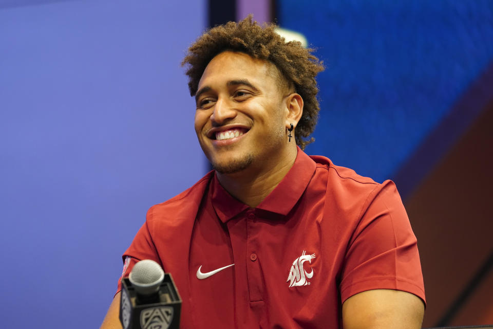 FILE - Washington State edge Ron Stone Jr. smiles at the NCAA college football Pac-12 media day. Friday, July 21, 2023, in Las Vegas. Washington State opens their season at Colorado State on Sept. 2. (AP Photo/Lucas Peltier, File)