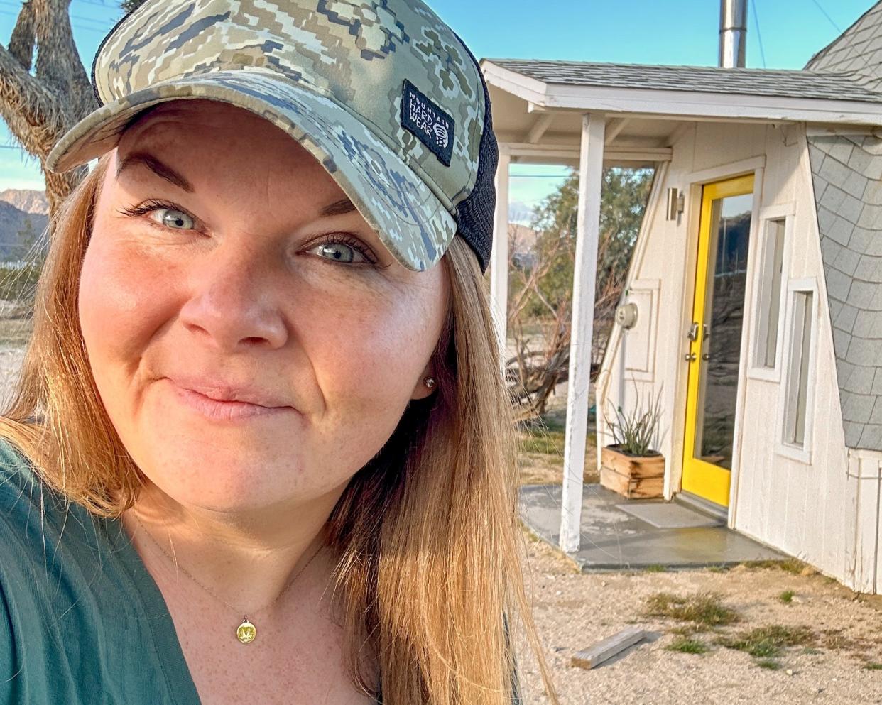 Author Molly Allen in front of Joshua tree dome