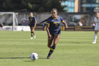 In this photo provided by Cal Athletics, University of California-Berkeley forward Anysa Gray brings the ball up field during an NCAA college soccer match against UC-San Diego at Edwards Stadium in Berkeley, Calif., Aug. 28, 2022. Nigel Wilson and twin sisters Anysa and Amaya Gray have been recognized for overcoming adversity to succeed on and off the field. Wilson, a basketball player for Pasadena City College, and the Gray twins, who play soccer for California, are this year's recipients of the CalHope Courage Award. They received their awards on Tuesday, May 9, 2023. (Al Sermeno/Cal Athletics via AP)