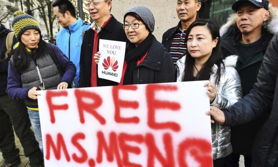 People demonstrate outside Vancouver courthouse prior to the bail hearing for Meng Wanzhou, Huawei’s chief financial officer on Monday.