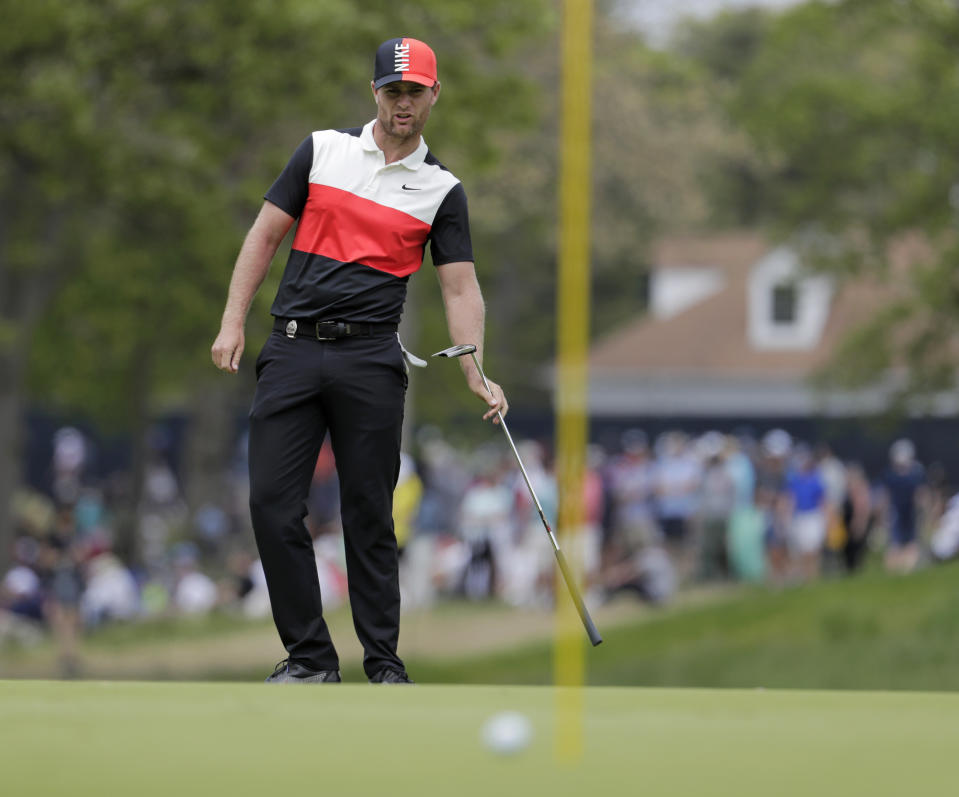 Lucas Bjerregaard, of Denmark, reacts to his putt on the third green during the final round of the PGA Championship golf tournament, Sunday, May 19, 2019, at Bethpage Black in Farmingdale, N.Y. (AP Photo/Julio Cortez)