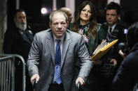 Harvey Weinstein leaves a Manhattan courthouse during his rape trial, Tuesday, Feb. 18, 2020, in New York. (AP Photo/John Minchillo)