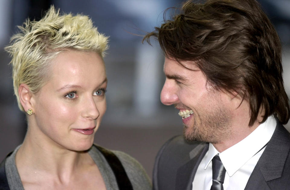 Actor Tom Cruise poses with co-star Samantha Morton as they arrive at the London premiere of their new film 'Minority Report' screened in London's Leicester Square Wednesday, June 26, 2002. (AP Photo/Richard Lewis)