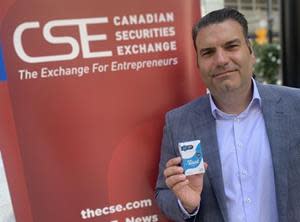 Taat CEO Setti Coscarella holding a Beyond Tobacco™ “Original” cigarette pack