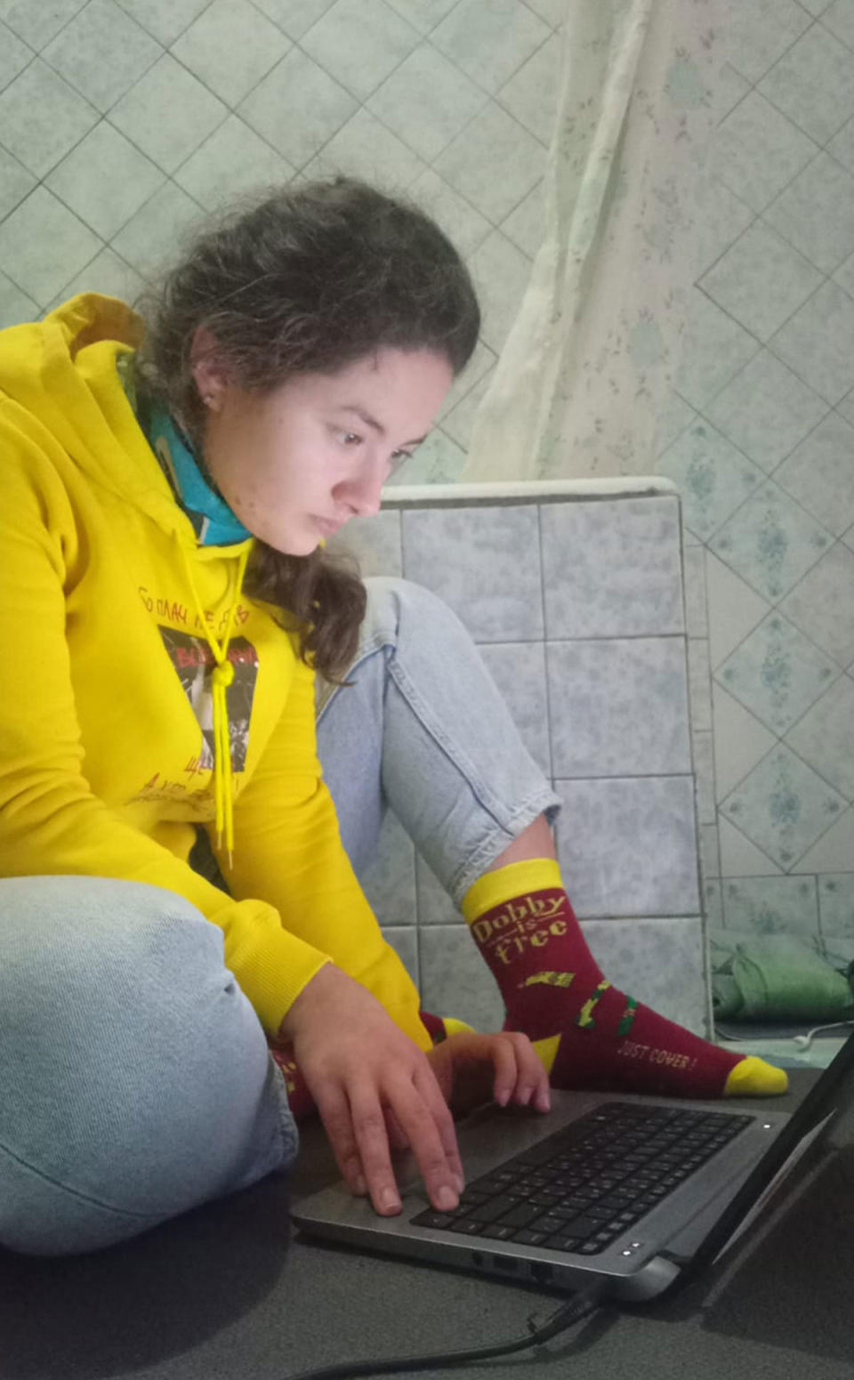 Pictured is 25-year-old Anastasia Russo, in her home in Kyiv, Ukraine.