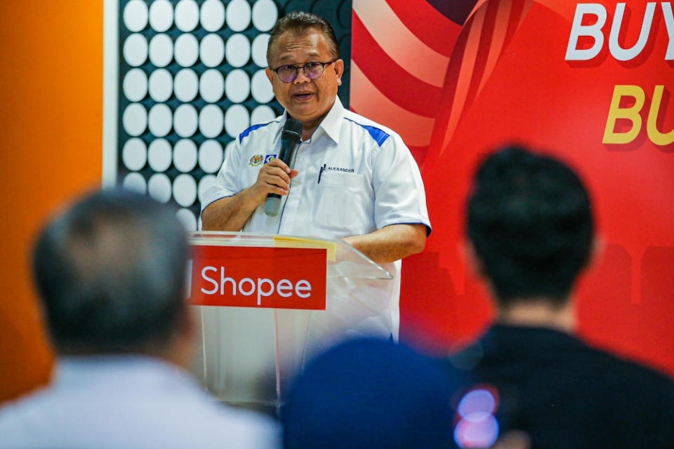Alexander says the partnership with Shopee will help drive the nation’s economy forward. — Picture by Hari Anggara