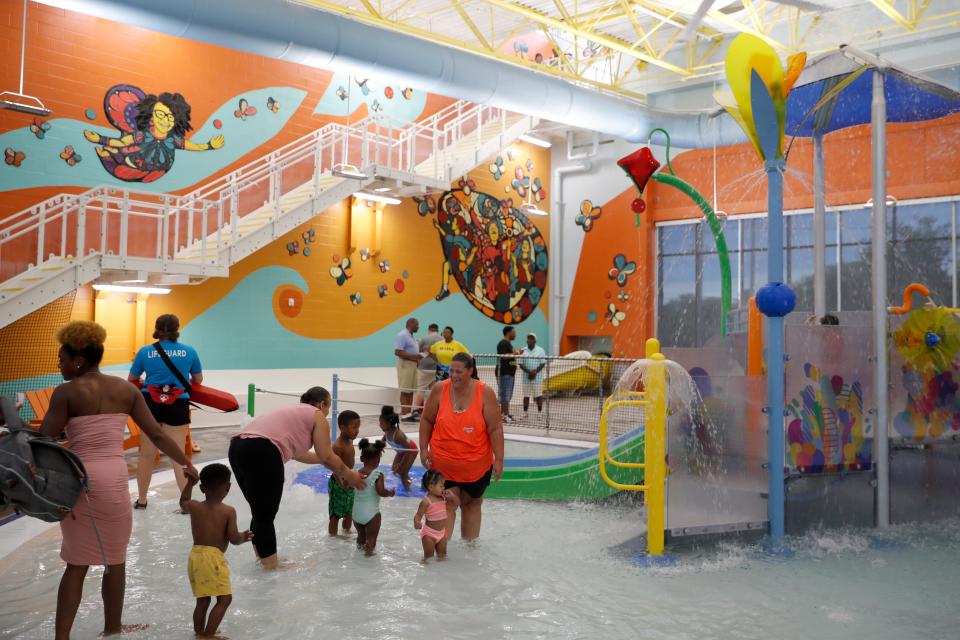 People play in the aquatic center at the Willa D. Johnson Recreation Center during an opening event for the facility in Oklahoma City, Saturday, July 15, 2023.