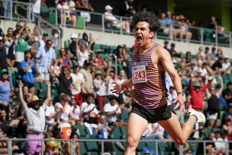 Marshfield’s Alexander Garcia-Silver crosses the finish line to win the 4A 3,000 meters at the OSAA state track and field championship at Hayward Field in Eugene Friday, May 26, 2023. Garcia-Silver broke the meet record of 8:31.13 set by Bully Harper in 1994 with his time of 8:31.08.