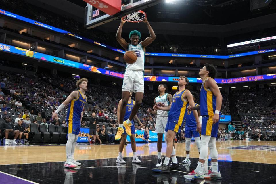 Charlotte Hornets forward Kai Jones (center) dunks against the Golden State Warriors during the fourth quarter at Golden 1 Center.