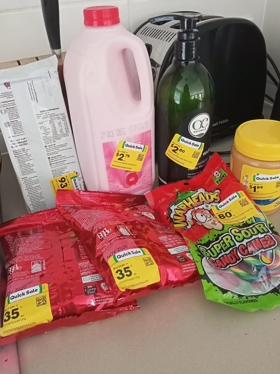 Shopper's Woolworths haul for less than $10 shown.