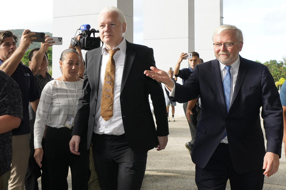 FILE - WikiLeaks founder Julian Assange, center, arrives at the United States courthouse in Saipan, Mariana Islands, June 26, 2024. The abrupt guilty plea by WikiLeaks founder Julian Assange was the culmination of negotiations that began a year and a half ago and accelerated in recent months. (AP Photo/Eugene Hoshiko, File)