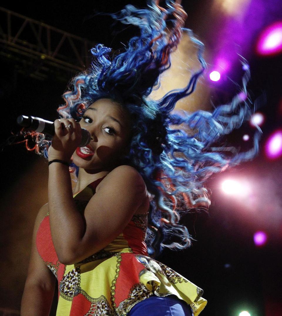 Zonnique Pullins of The OMG Girlz performs at the Essence Music Festival in New Orleans, Thursday, July 5, 2012. This is the first day of the four day music festival. (Photo by Bill Haber/Invision/AP)