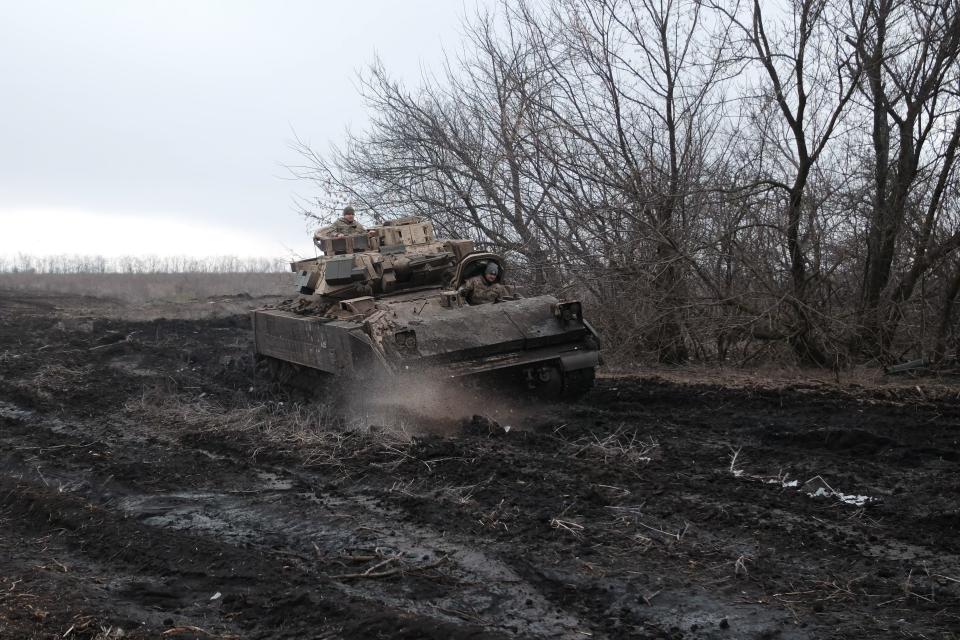 Ukrainian soldiers of 47th Mechanized Brigade drives on M2 Bradley infantry fighting vehicle on Avdiivka direction on Feb. 23, 2024 in Donetsk Oblast, Ukraine.