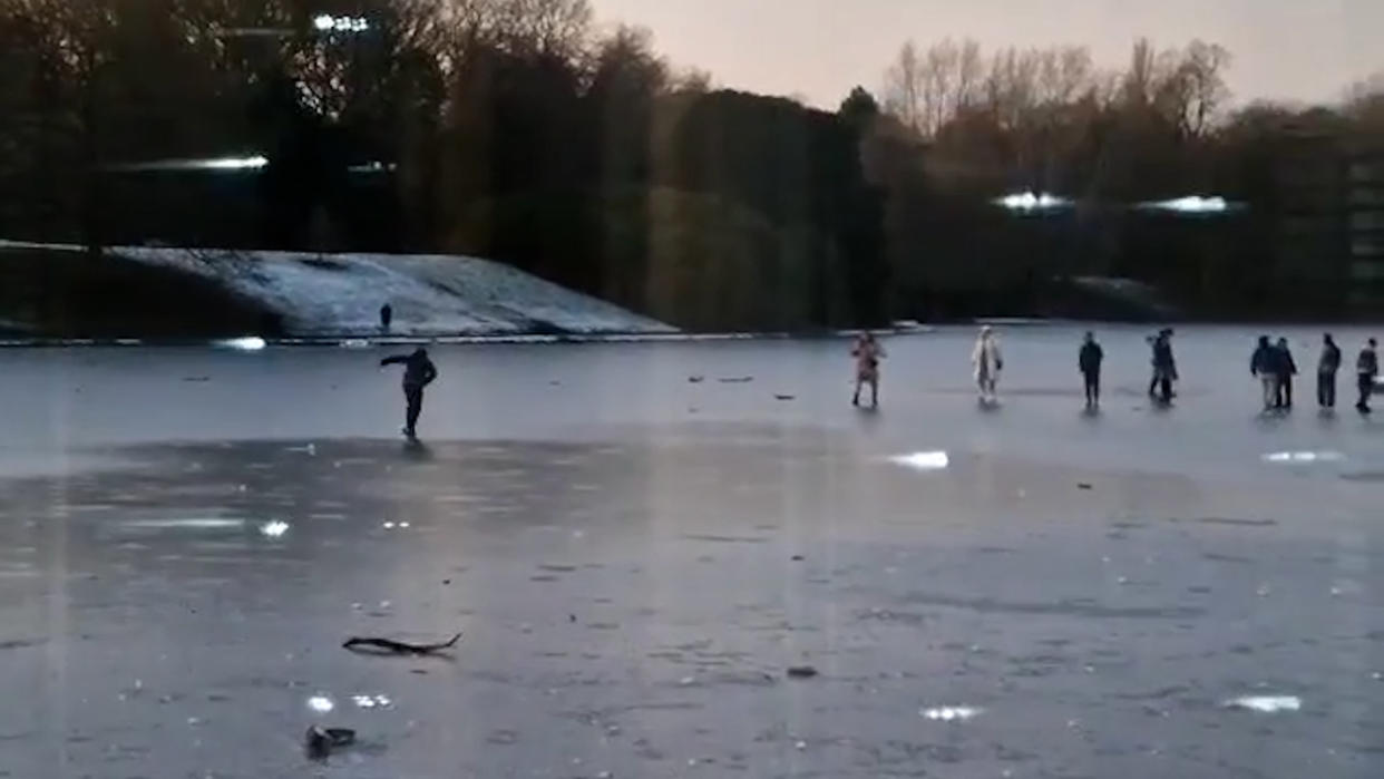 Footage showing a group of people on a frozen lake just dies after four children died after plunging into freezing water has sparked concerns. (SWNS)