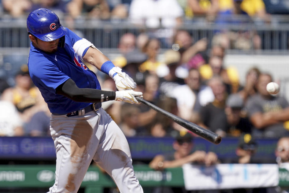 Chicago Cubs' Seiya Suzuki hits an RBI double against the Pittsburgh Pirates in the fifth inning of a baseball game in Pittsburgh, Sunday, Aug. 27, 2023. (AP Photo/Matt Freed)