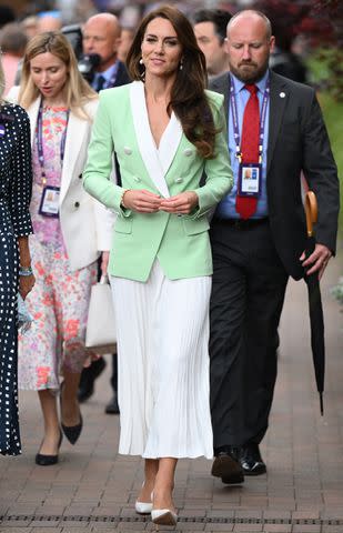 <p>Karwai Tang/WireImage</p> Kate Middleton attends Wimbledon in 2023.