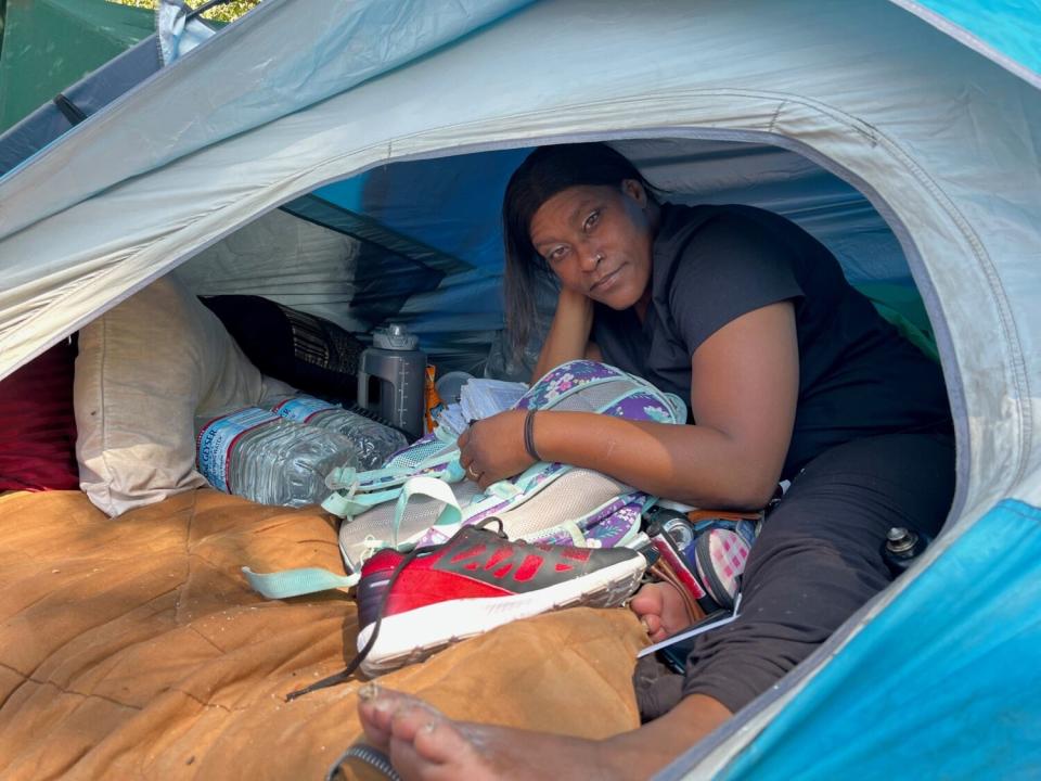 L'aMaira Tyson in her tent during a recent heat wave in Sacramento.