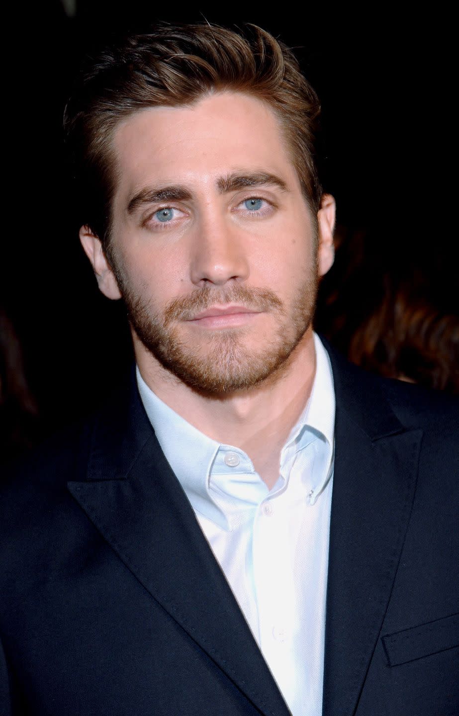 <p>Jake Gyllenhaal has become known for his consistent scruff and short swept hair ever since the actor was starting out in movies like <em>Donnie Darko</em>. </p>