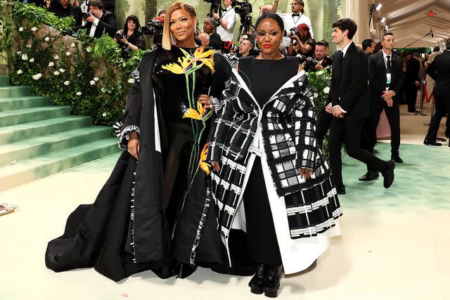 <p>Jamie McCarthy/Getty</p> Queen Latifah and Eboni Nichols at the Met Gala on May 6, 2024