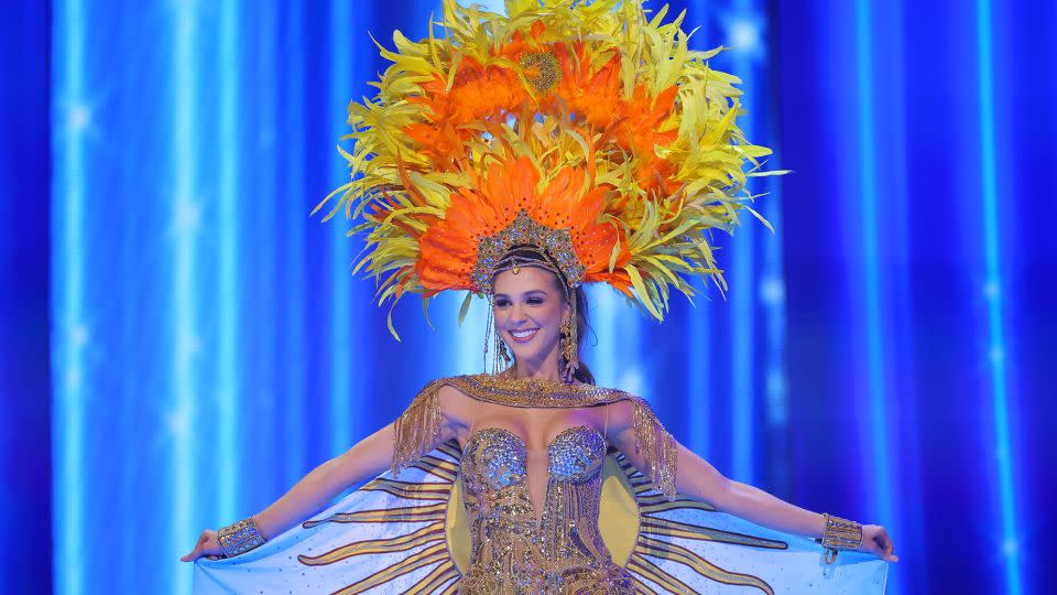 The sun was also coming up on Miss Argentina's costume, literally — it referenced her country's national symbol, the Sun of May, in numerous ways. - Hector Vivas/Getty Images