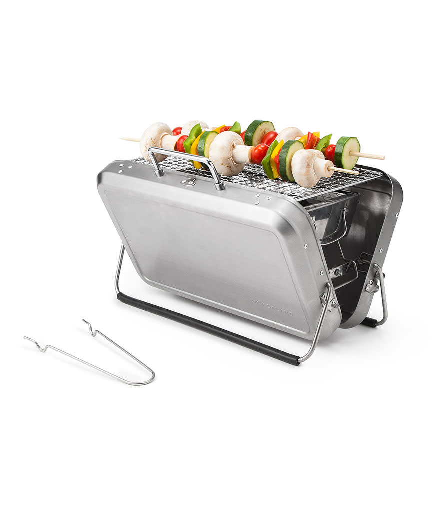 <p>Uncommon Goods Portable Briefcase BBQ Grill, $80, <a rel="nofollow noopener" href="http://www.uncommongoods.com/product/portable-briefcase-bbq-grill" target="_blank" data-ylk="slk:uncommongoods.com;elm:context_link;itc:0;sec:content-canvas" class="link ">uncommongoods.com</a></p>