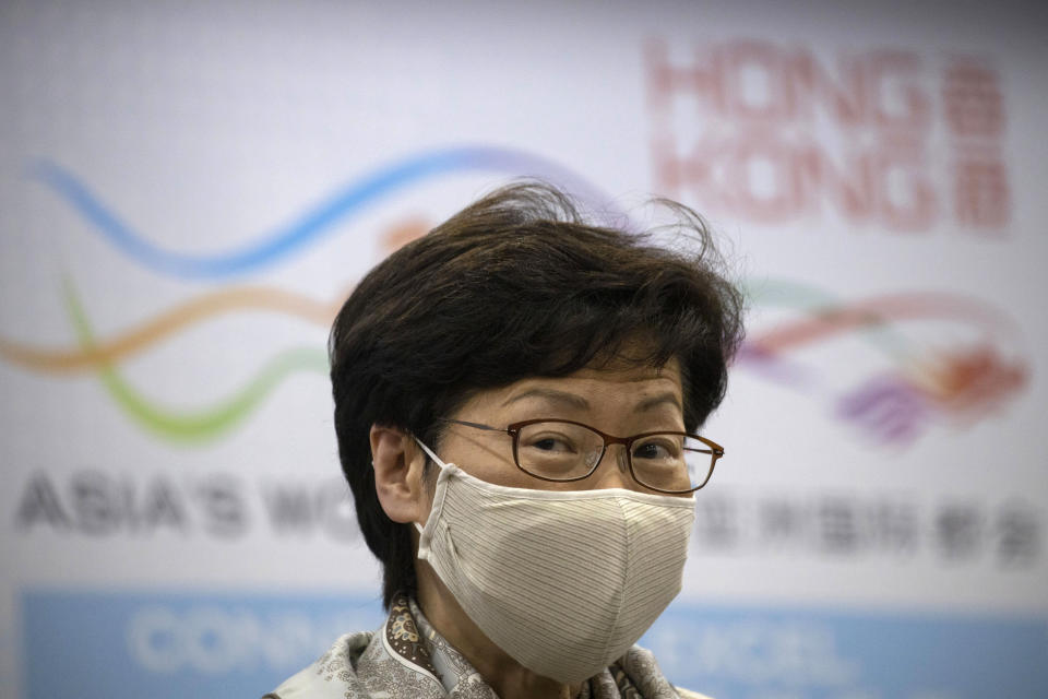 Hong Kong Chief Executive Carrie Lam speaks during a press conference after meeting Chinese leadership in Beijing on Wednesday, June 3, 2020. British Prime Minister Boris Johnson said the United Kingdom stands ready to open the door to almost 3 million Hong Kong citizens, as the city's leader arrived in Beijing on Wednesday for meetings on a planned national security law that has many worried about their future. (AP Photo/Ng Han Guan)