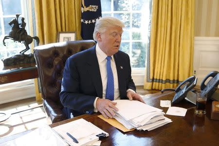 U.S. President Donald Trump is interviewed by Reuters in the Oval Office at the White House in Washington, U.S., February 23, 2017. REUTERS/Jonathan Ernst