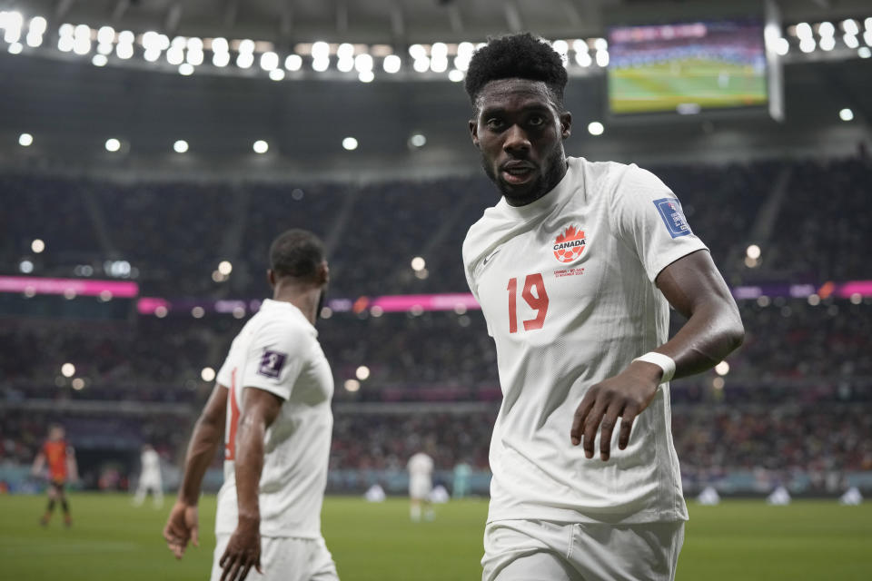 Canada's Alphonso Davies during the World Cup group F soccer match between Belgium and Canada, at the Ahmad Bin Ali Stadium in Doha, Qatar, Wednesday, Nov. 23, 2022. (AP Photo/Hassan Ammar)