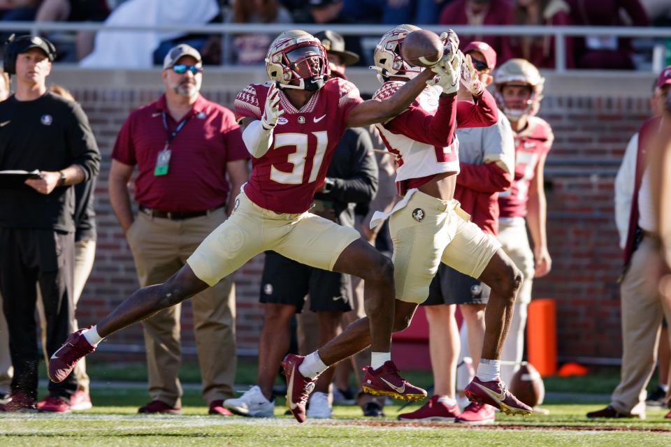 Florida State Seminoles defensive back Demorie Tate (31) attempts to intercept the pass. The Florida State Seminoles hosted their annual Garnet and Gold spring game at Doak Campbell Stadium on Saturday, April 9, 2022.