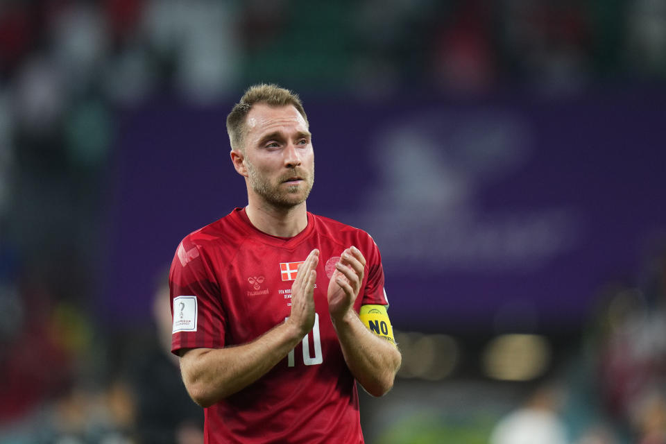 Denmark's Christian Eriksen salutes supporters at the end of the World Cup group D soccer match between Denmark and Tunisia, at the Education City Stadium in Al Rayyan , Qatar, Tuesday, Nov. 22, 2022. (AP Photo/Petr David Josek)