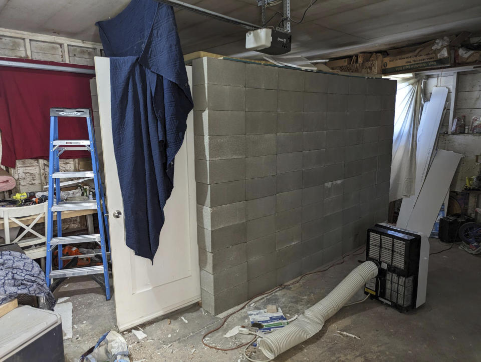 FILE - This undated photo provided by the Federal Bureau of Investigation's Portland Field Office shows a makeshift cinderblock cell in Klamath Falls, Ore., allegedly used by Negasi Zuberi. Zuberi, the man arrested in July 2023 for allegedly kidnapping a woman in Seattle, driving her hundreds of miles to his home in Klamath Falls and locking her in the makeshift cinder block cell, is facing fresh charges in a new, separate state case against him, court documents show. A grand jury in southern Oregon’s Klamath County indicted Zuberi on 11 counts, including first-degree rape, sexual abuse and kidnapping, on Sept. 11, 2023. (FBI via AP, File)