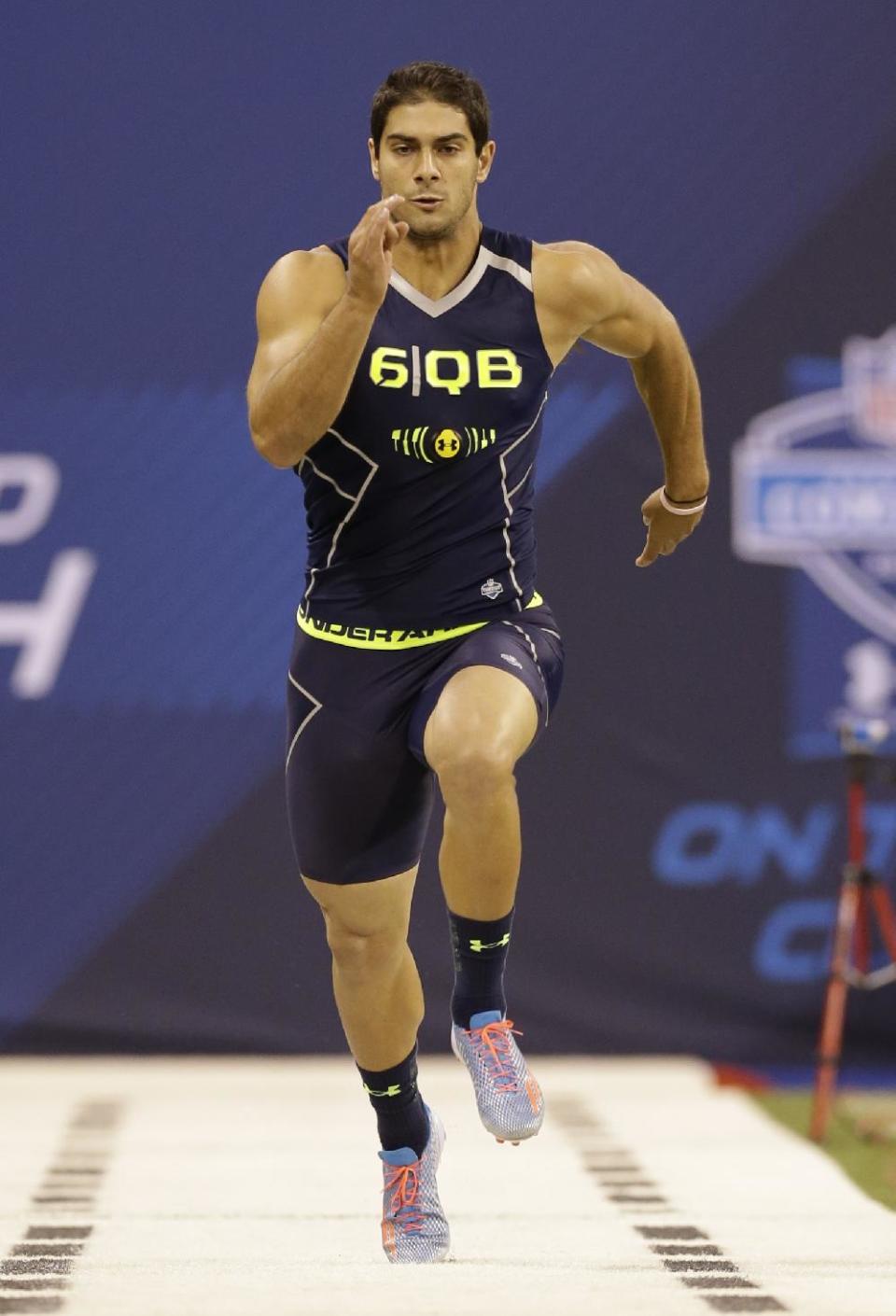 Eastern Illinois quarterback Jimmy Garoppolo runs a drill at the NFL football scouting combine in Indianapolis, Sunday, Feb. 23, 2014. (AP Photo/Nam Y. Huh)