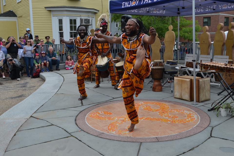 Members of the Akwaabe Ensemble perform during the Juneteenth ceremony in Portsmouth Monday, June 19, 2023.