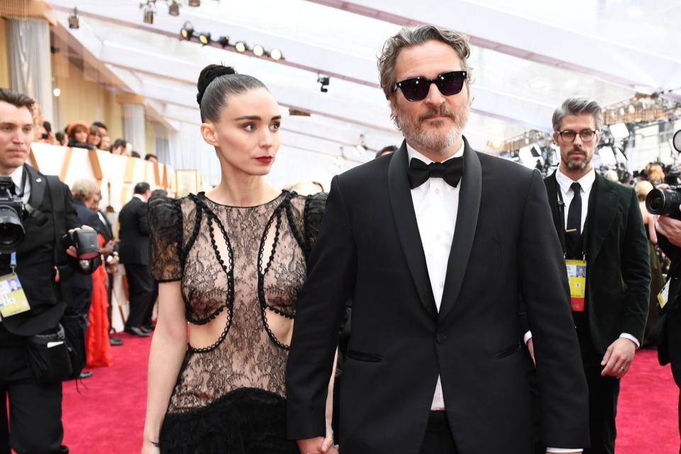 The pair looked slick at the Academy Awards (AFP via Getty Images)