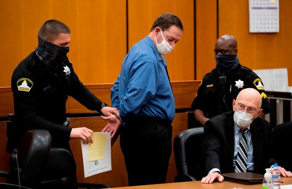 A Sacramento Sheriff’s deputy handcuffs NorCal Rapist Roy Charles Waller after he was found guilty in Sacramento Superior Court on Wednesday, Nov. 18, 2020. Waller was convicted of 46 counts related to raping nine women in six Northern California cities between 1991 and 2006 based on DNA evidence.