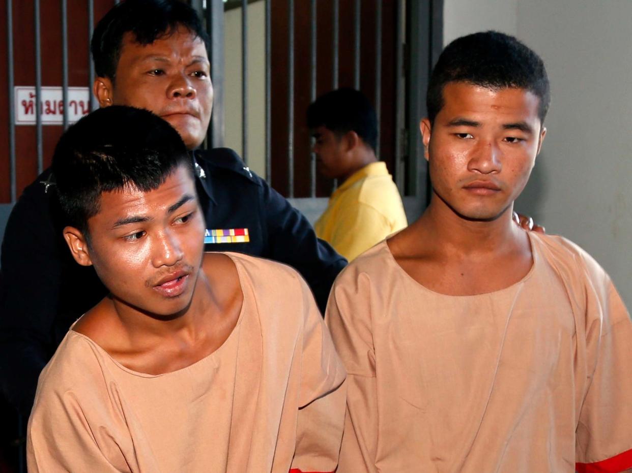 Zaw Lin (R) and Wai Phyo (L), convicted of the killing of two British tourists, are escorted by a Thai police officer: EPA