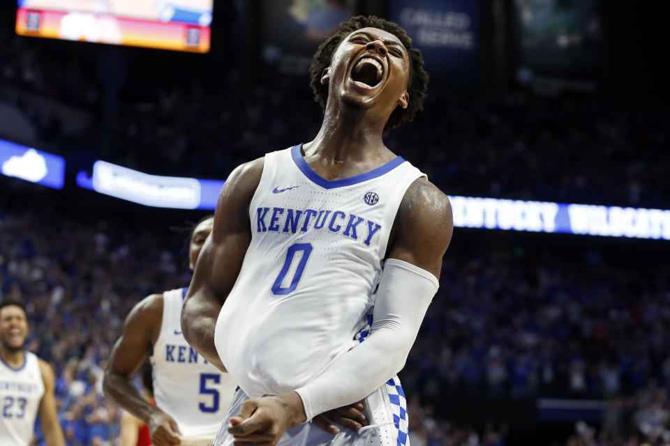 Kentucky's Ashton Hagans celebrates after an overtime win against Louisville in a NCAA college basketball game in Lexington, Ky., Saturday, Dec. 28, 2019. (AP Photo/James Crisp)