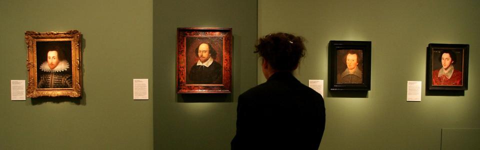 A woman looks at  portraits of William Shakespeare on display at the National Portrait Gallery in London as part of an exhibition, "Searching for Shakespeare," of portraits and manuscripts from Shakespeare's lifetime, in 2006. 
From left: the portrait  known as the Janssen portrait dated 1610. Second from the left, a painting attributed to a little-known artist named John Taylor, dated by experts to between 1600 and 1610, is the so-called Chandos portrait. The painting second from right is known as the Sanders portrait, dated 1603,  and the artwork, right, is known as Grafton portrait dated 1588. The Grafton is believed to not show the real Shakespeare.