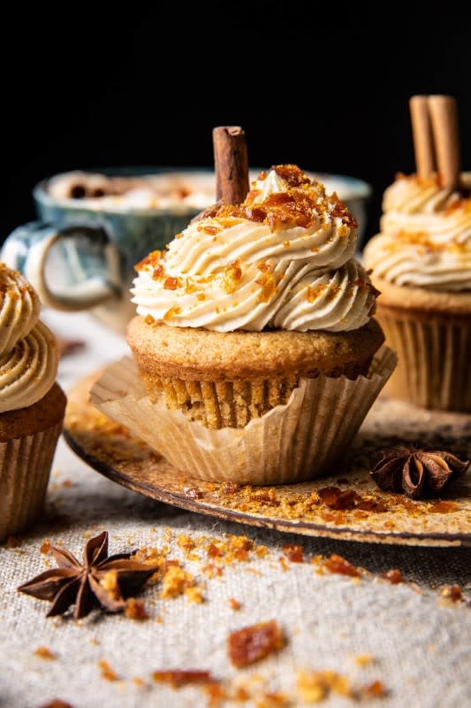 <p>Half Baked Harvest</p><p>Chai latte cupcakes are frosted with creamy caramel-like frosting and topped with salted caramel brulée candy.</p><p><strong>Get the recipe:</strong> <a href="https://www.halfbakedharvest.com/chai-latte-cupcakes/" rel="nofollow noopener" target="_blank" data-ylk="slk:Chai Latte Cupcakes with Caramel Brulée Frosting;elm:context_link;itc:0;sec:content-canvas" class="link rapid-noclick-resp"><strong>Chai Latte Cupcakes with Caramel Brulée Frosting</strong></a></p>