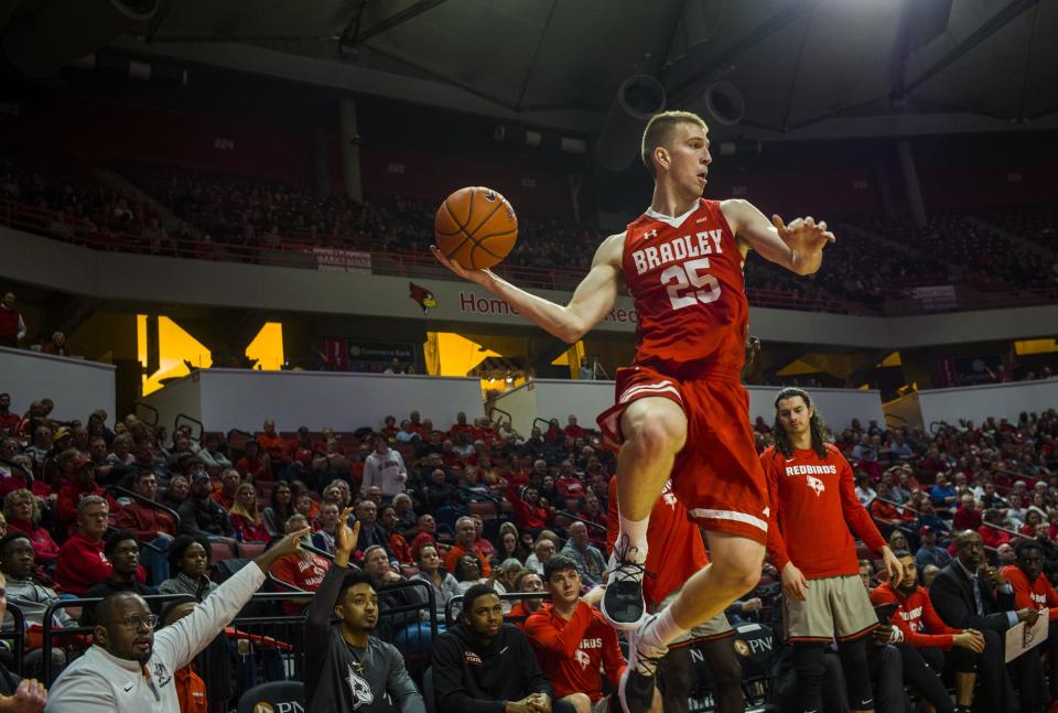 Bradley's Nate Kennell saves a loose ball during a 2020 game against Illinois State at Redbird Arena in Normal.
