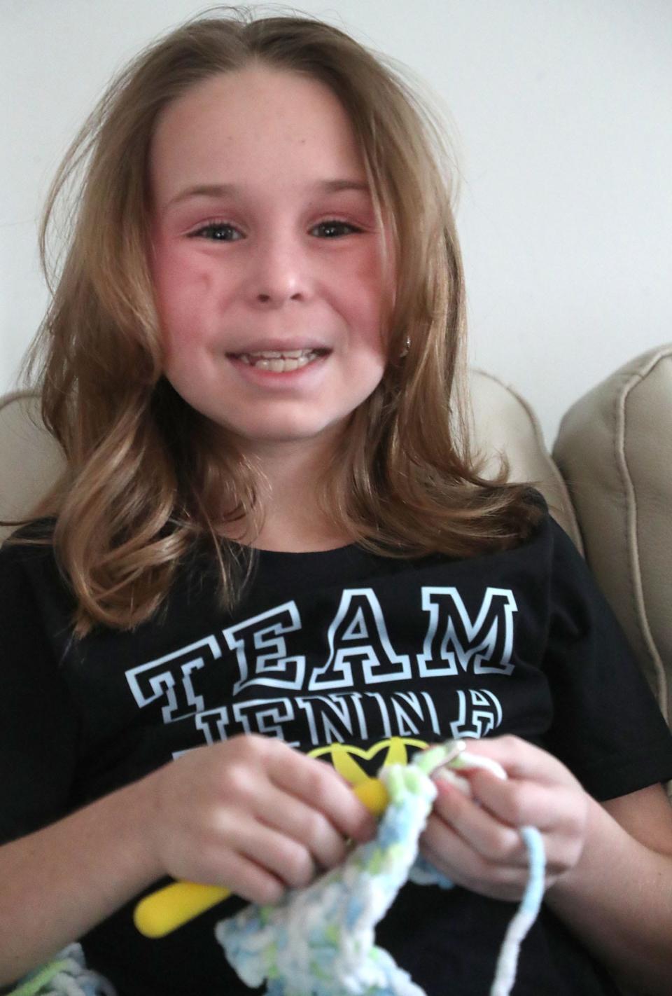 Jenna Teachman, 10, crochets a top to wear during upcoming chemo treatments on a recent afternoon in the family's Port Orange home. Jenna was diagnosed with Stage 4 pancreatic cancer, a diagnosis that resulted from a fall from a horse this past fall. “I can’t really comprehend it,” she said of her diagnosis.