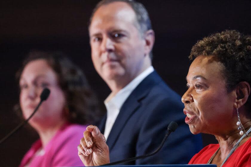 Los Angeles, CA - October 08: Rep. Katie Porter, Rep. Adam Schiff, and Rep. Barbara Lee, left to right participate in a debate on stage with other democrats who are running to succeed Sen. Feinstein at Westing Bonaventure Hotel on Sunday, Oct. 8, 2023 in Los Angeles, CA. (Dania Maxwell / Los Angeles Times)