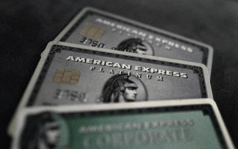 Credit cards of American Express are photographed in this illustration picture in this March 17, 2016, file photo. REUTERS/Kai Pfaffenbach/Illustration/Files GLOBAL BUSINESS WEEK AHEAD PACKAGE - SEARCH 'BUSINESS WEEK AHEAD APRIL 18' FOR ALL IMAGES