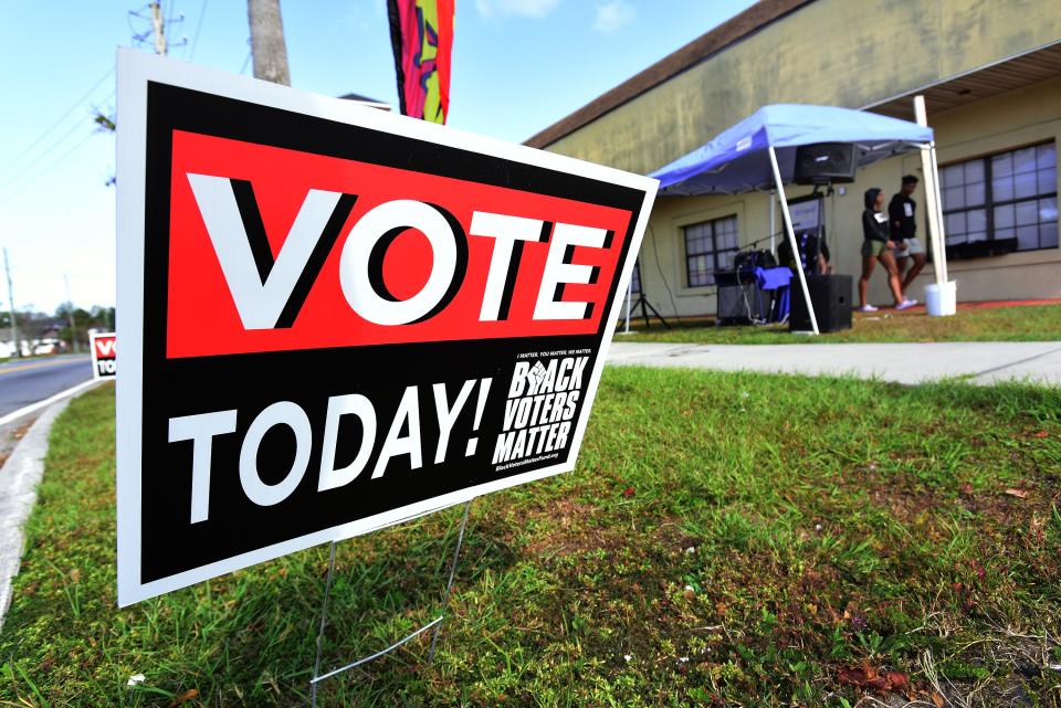 A sign along Myrtle Avenue near Mt. Olive Primitive Baptist Church was part of the church's effort to get the community out to vote during the November 2022 midterm elections.