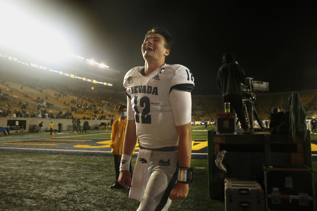 Nevada Wolf Pack quarterback Carson Strong (12) celebrates after a win against the California Golden Bears during an NCAA football game on Saturday, Sept. 4, 2021 in Berkeley, Calif. (AP Photo/Lachlan Cunningham)