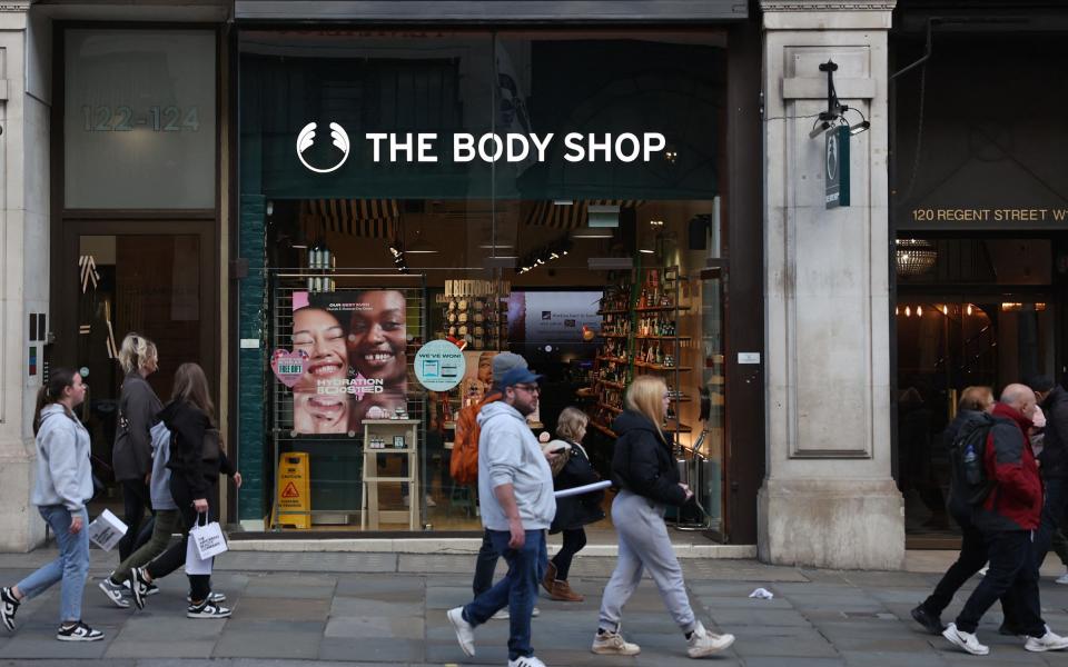 Pedestrians pass a branch of The Body Shop on Regent Street in central London on February 12, 2024