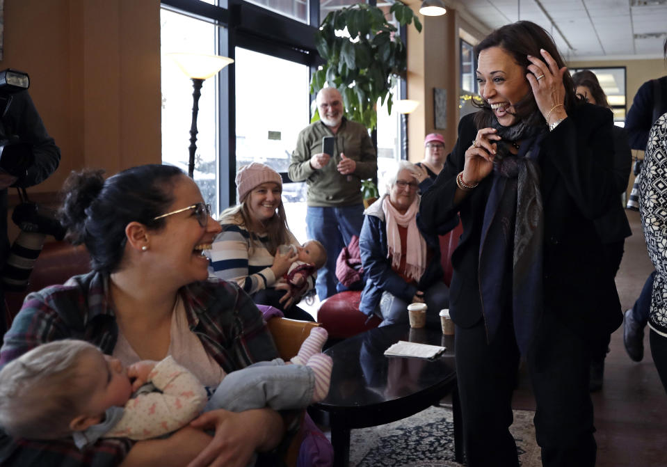 Democratic presidential candidate Sen. Kamala Harris, D-Calif., greets Emily Ragsdale and her baby, Noa, at Gibson's Bookstore & Cafe during a campaign stop, Monday, Feb. 18, 2019, in Concord, N.H. (AP Photo/Elise Amendola)