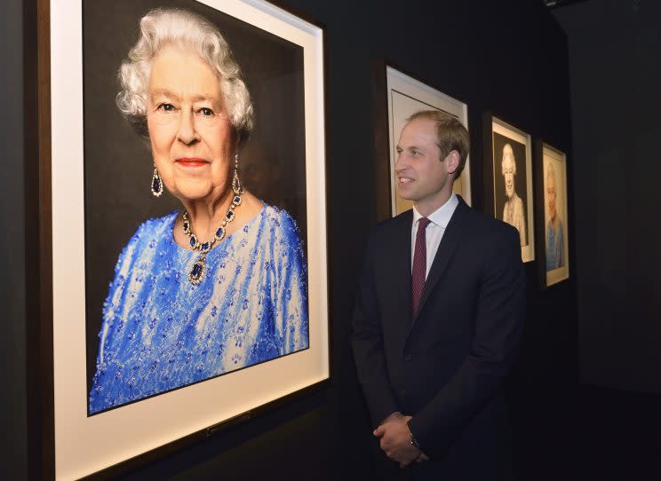 <i>Prince William viewing the original portrait in 2015 [Photo: PA]</i>