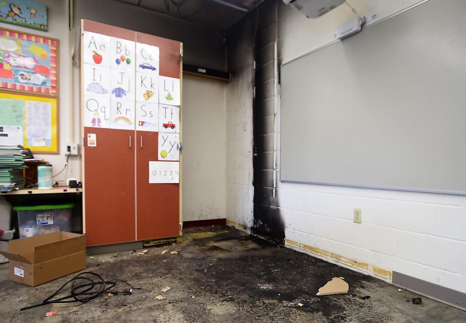 Fire damage, caused by heating lamps used in a science experiment to hatch baby chicks, is evident at Elk Valley Elementary School in Lake City on May 19.